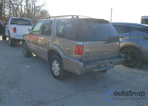 1999 GMC Envoy z USA, uszkodzony, nr VIN 1GKDT13W0X2952675